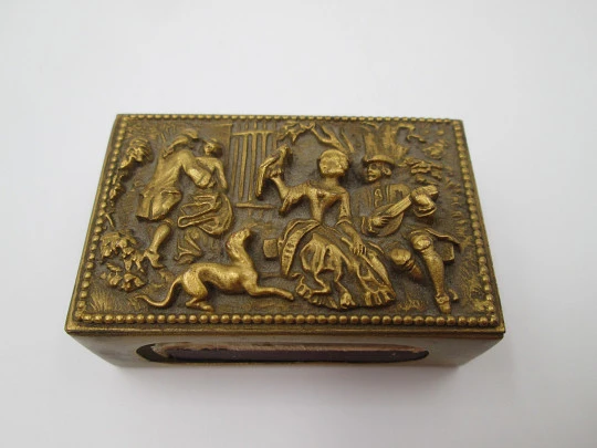 Historiated matchbox. Golden alpaca. High relief. Romantic scene. France. 1960