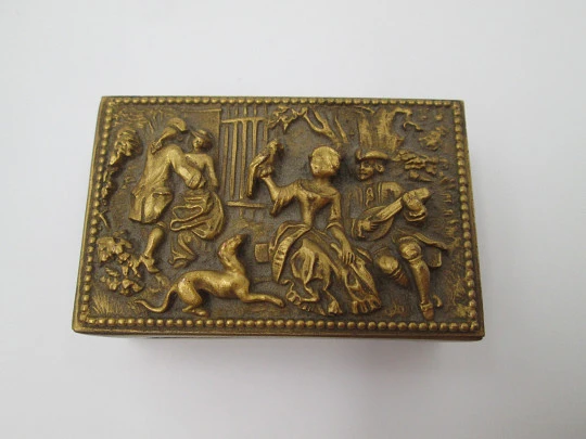 Historiated matchbox. Golden alpaca. High relief. Romantic scene. France. 1960