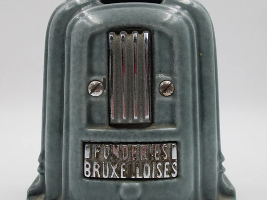 Hucha publicitaria Fonderies Bruxelloises. Hierro, esmalte y metal