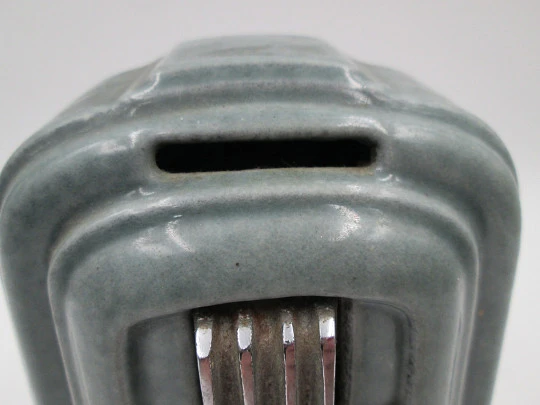 Hucha publicitaria Fonderies Bruxelloises. Hierro, esmalte y metal