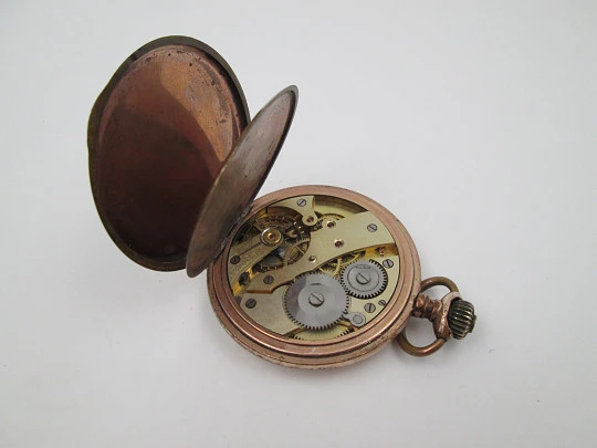 Hunter-case pocket watch. Gold plated metal. Stem winding. Porcelain dial. 1940's. Swiss