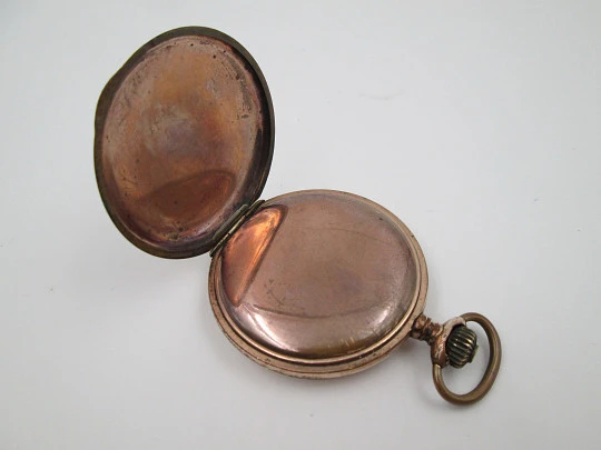 Hunter-case pocket watch. Gold plated metal. Stem winding. Porcelain dial. 1940's. Swiss