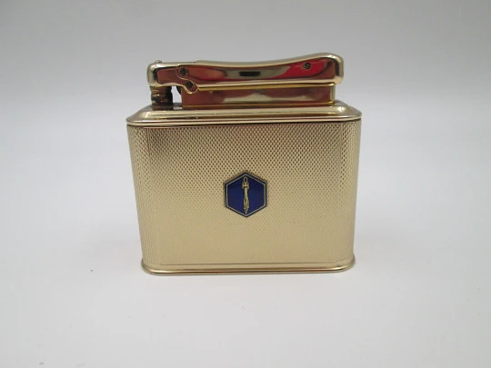 Ibelo Monopol petrol table lighter. Gold plated metal and enamel detail. Germany. 1950's Ibelo Monopol petrol table lighter. Gold plated metal and enamel detail. Germany. 1950's