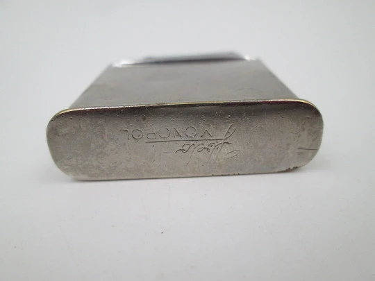 Ibelo Monopol pocket petrol lighter. Silver plated. Flautist motif. Germany. 1950's