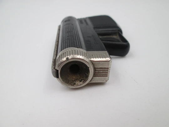 IMCO Gunlite G 66-R pocket butane lighter. Black plastic and silver plated. Austria. 1970's