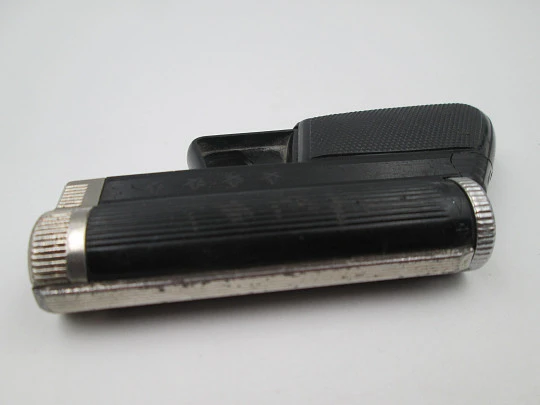 IMCO Gunlite G 66-R pocket butane lighter. Black plastic and silver plated. Austria. 1970's