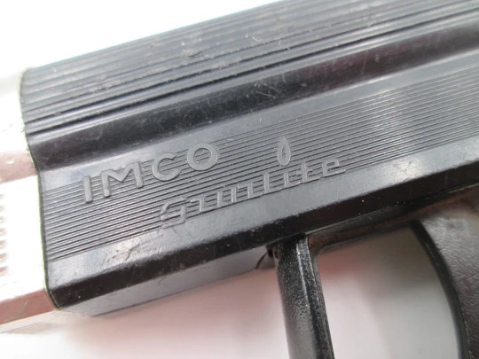 IMCO Gunlite G 66-R pocket butane lighter. Black plastic and silver plated. Austria. 1970's