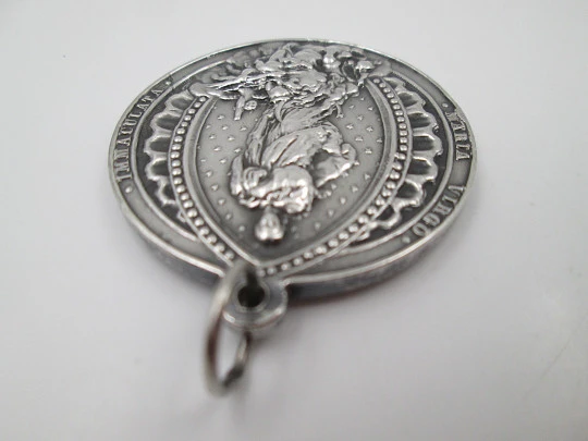 Immaculate Conception medal. Sterling silver. High relief. Ring and hole. 1940's. Spain