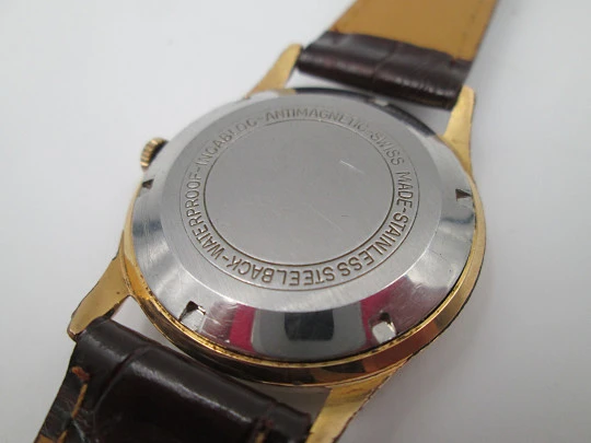 Incitus. Stainless steel & gold plated. Manual wind. Strap. 1960's. Swiss