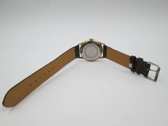 Incitus. Stainless steel & gold plated. Manual wind. Strap. 1960's. Swiss