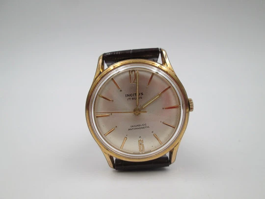 Incitus. Stainless steel & gold plated. Manual wind. Strap. 1960's. Swiss