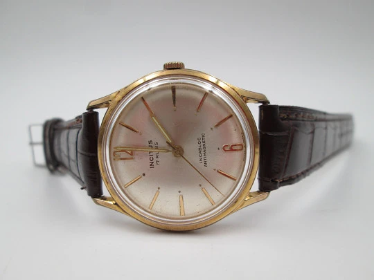 Incitus. Stainless steel & gold plated. Manual wind. Strap. 1960's. Swiss