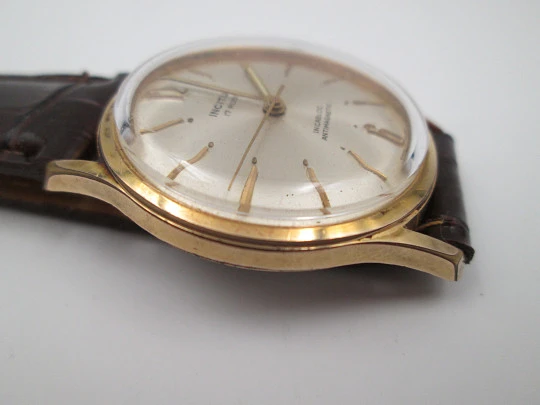 Incitus. Stainless steel & gold plated. Manual wind. Strap. 1960's. Swiss