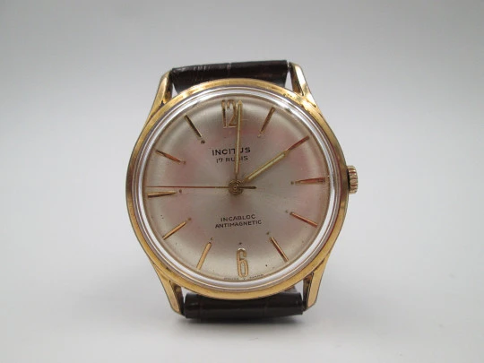 Incitus. Stainless steel & gold plated. Manual wind. Strap. 1960's. Swiss