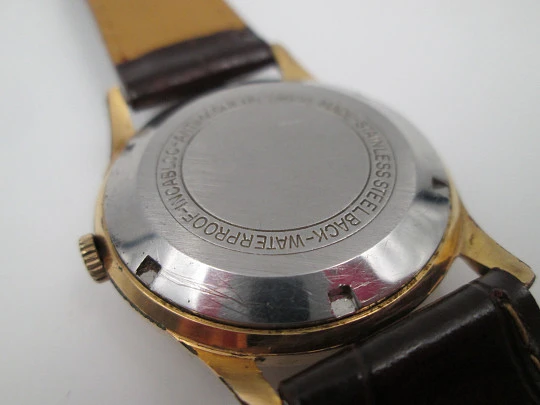 Incitus. Stainless steel & gold plated. Manual wind. Strap. 1960's. Swiss