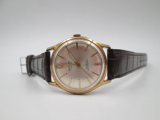 Incitus. Stainless steel & gold plated. Manual wind. Strap. 1960's. Swiss