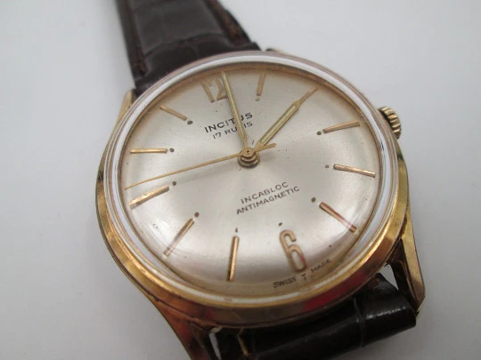 Incitus. Stainless steel & gold plated. Manual wind. Strap. 1960's. Swiss