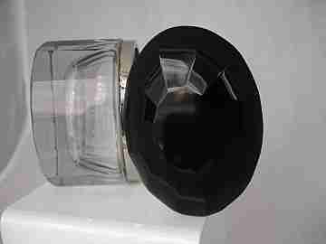Inkwell. Faceted glass. Oval shape. Black cap. Silver metal. 1940's