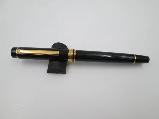 Inoxcrom Andreas Guilloche. Black plastic & gold plated details. Golden nib. 1990's