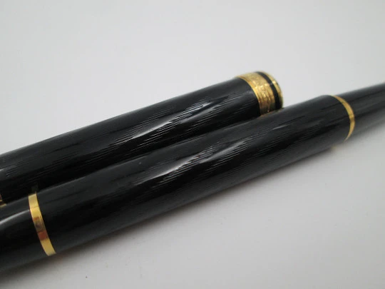 Inoxcrom Andreas Guilloche. Black plastic & gold plated details. Golden nib. 1990's