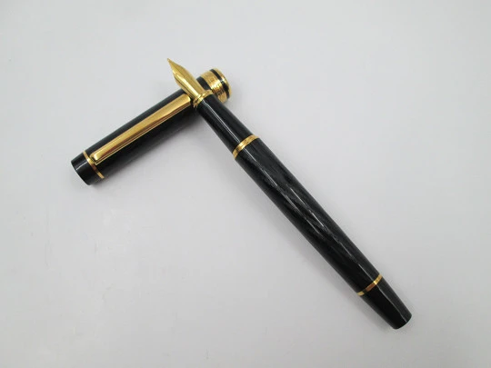 Inoxcrom Andreas Guilloche. Black plastic & gold plated details. Golden nib. 1990's