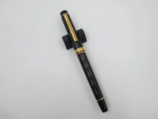 Inoxcrom Andreas Guilloche. Black plastic & gold plated details. Golden nib. 1990's