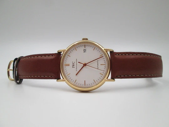 IWC Portofino men's wristwatch. 18k yellow gold. White dial. Leather box. Swiss. 2004