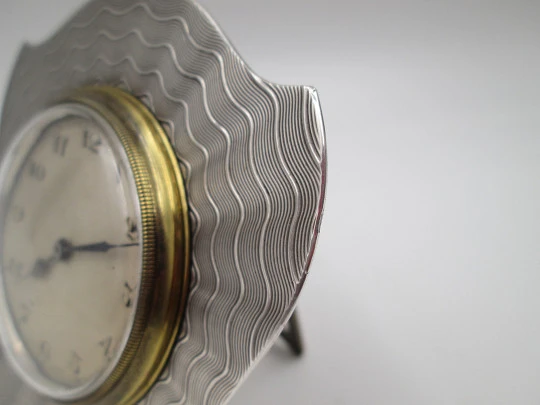 J. H. Williams table & desk clock. Sterling silver and bronze. Wind-up. Swiss / UK. 1920's