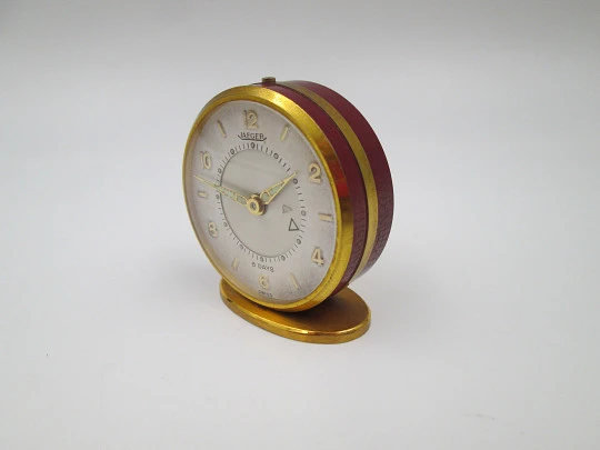 Jaeger travel desk alarm clock. Bronze and red enamel. 8 day wind-up caliber. Swiss. 1970's