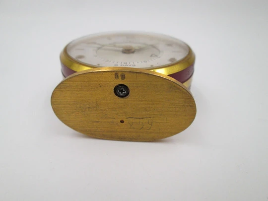 Jaeger travel desk alarm clock. Bronze and red enamel. 8 day wind-up caliber. Swiss. 1970's