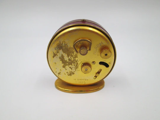 Jaeger travel desk alarm clock. Bronze and red enamel. 8 day wind-up caliber. Swiss. 1970's