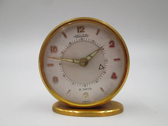 Jaeger travel desk alarm clock. Bronze and red enamel. 8 day wind-up caliber. Swiss. 1970's