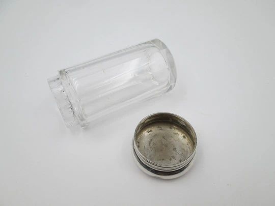 James Howell dressing table bottle. Sterling silver lid & faceted glass. 1900's. England