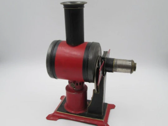 Jean Schoenner magic lantern. Painted and nickel tinplate. Slides and oil lamp. 1890's