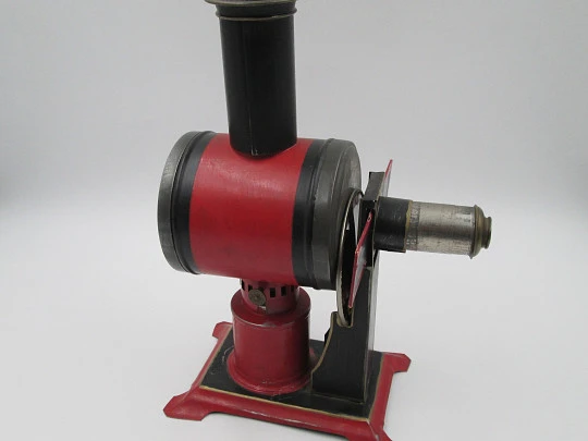 Jean Schoenner magic lantern. Painted and nickel tinplate. Slides and oil lamp. 1890's