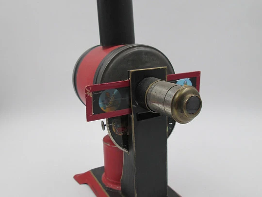 Jean Schoenner magic lantern. Painted and nickel tinplate. Slides and oil lamp. 1890's