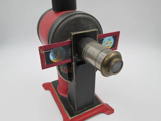 Jean Schoenner magic lantern. Painted and nickel tinplate. Slides and oil lamp. 1890's