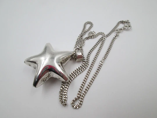 Jingle bell star pendant with braided chain. 925 sterling silver. Spain