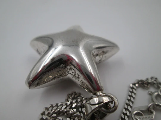 Jingle bell star pendant with braided chain. 925 sterling silver. Spain