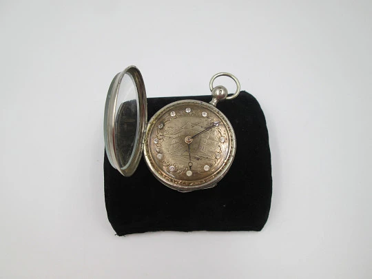 Jn. Ls. Debrit à Genève pocket watch chimes hour quarter. Silver plated. Ornate cooper dial