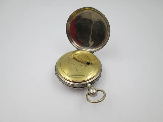 Jn. Ls. Debrit à Genève pocket watch chimes hour quarter. Silver plated. Ornate cooper dial