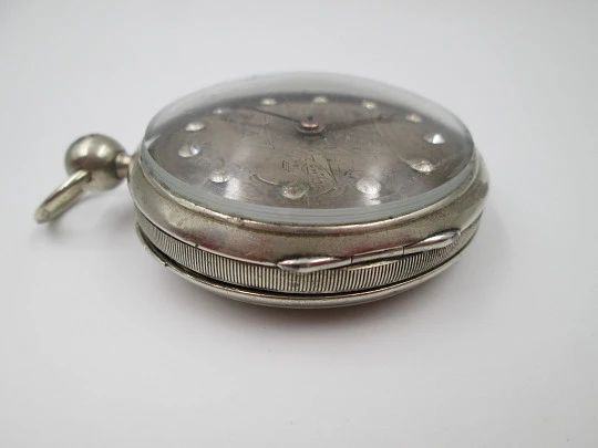 Jn. Ls. Debrit à Genève pocket watch chimes hour quarter. Silver plated. Ornate cooper dial