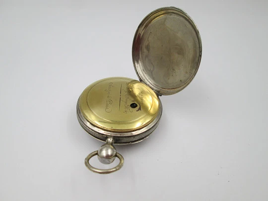Jn. Ls. Debrit à Genève pocket watch chimes hour quarter. Silver plated. Ornate cooper dial