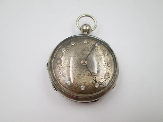 Jn. Ls. Debrit à Genève pocket watch chimes hour quarter. Silver plated. Ornate cooper dial