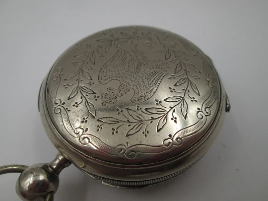 Jn. Ls. Debrit à Genève pocket watch chimes hour quarter. Silver plated. Ornate cooper dial
