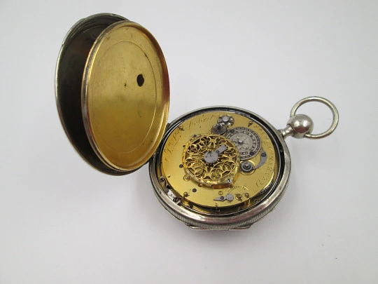 Jn. Ls. Debrit à Genève pocket watch chimes hour quarter. Silver plated. Ornate cooper dial