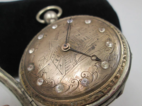 Jn. Ls. Debrit à Genève pocket watch chimes hour quarter. Silver plated. Ornate cooper dial