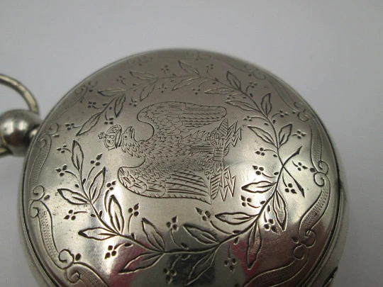 Jn. Ls. Debrit à Genève pocket watch chimes hour quarter. Silver plated. Ornate cooper dial