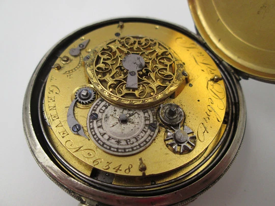Jn. Ls. Debrit à Genève pocket watch chimes hour quarter. Silver plated. Ornate cooper dial