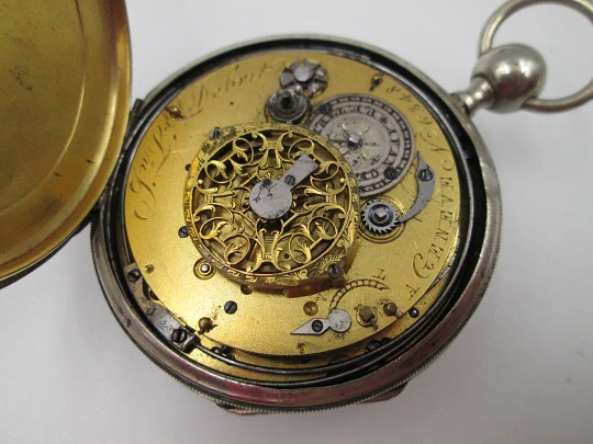 Jn. Ls. Debrit à Genève pocket watch chimes hour quarter. Silver plated. Ornate cooper dial